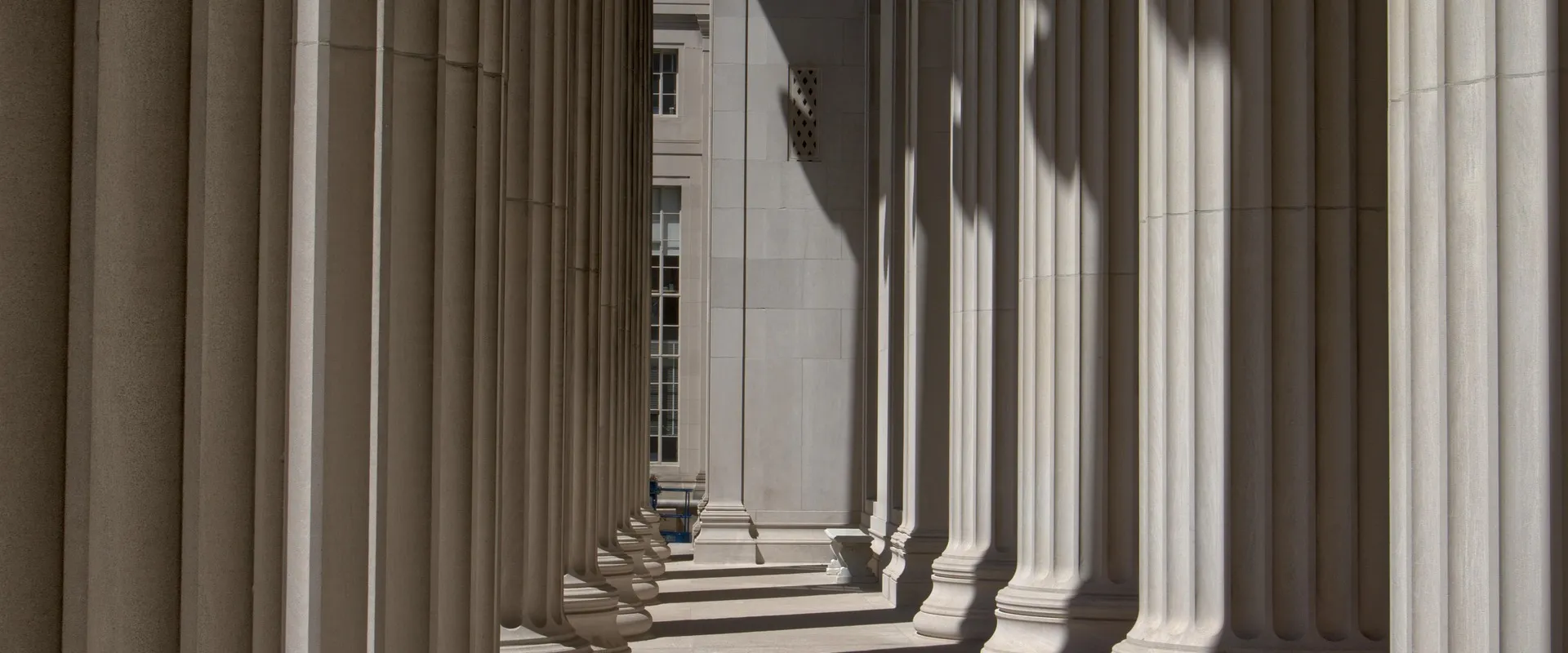 Classical columns evoking legal tradition and authority